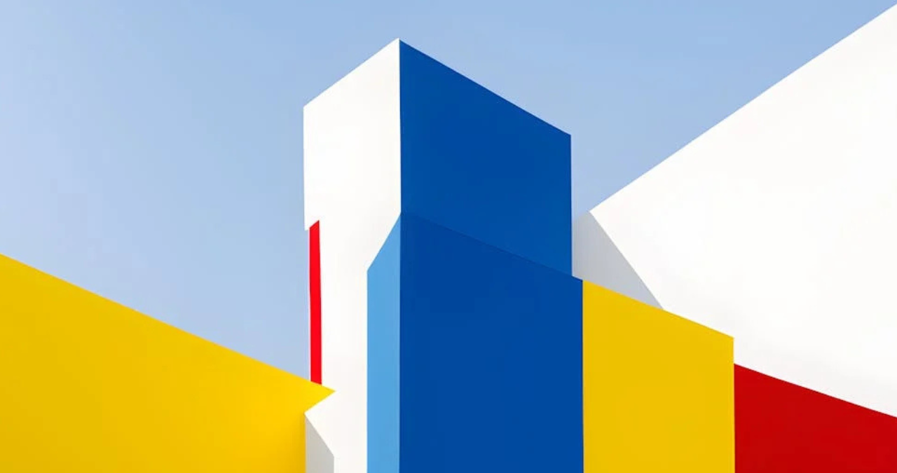 Bold and modern commercial painting with vibrant colors on a geometric building design.